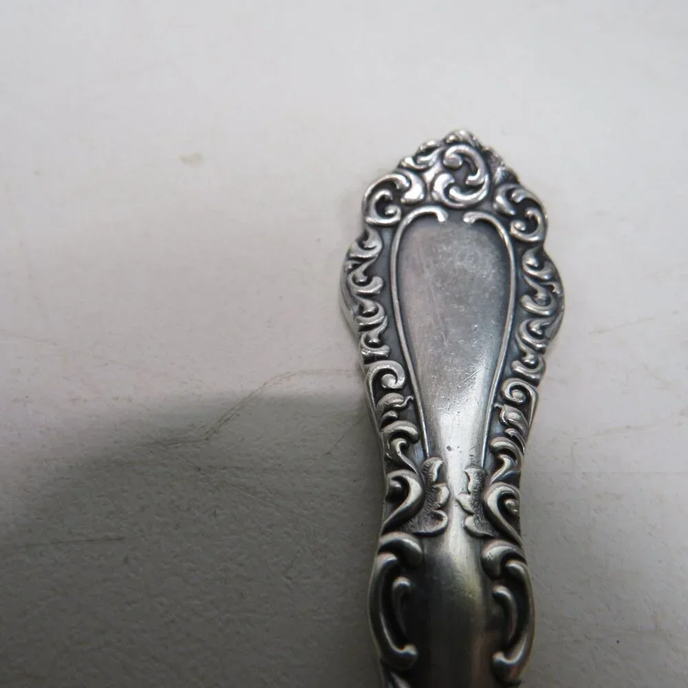 Webster Twisted Handle Butter Knife silver plated S.L. & G.H. Rogers Company A1